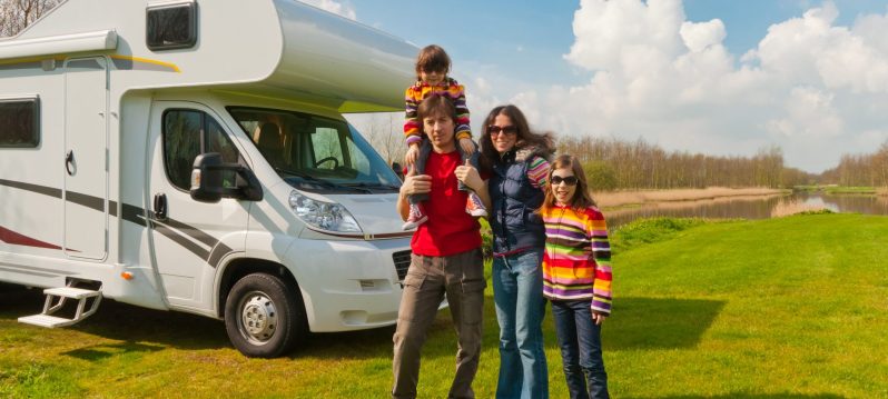 Family vacation in camping. Travel on motorhome with kids